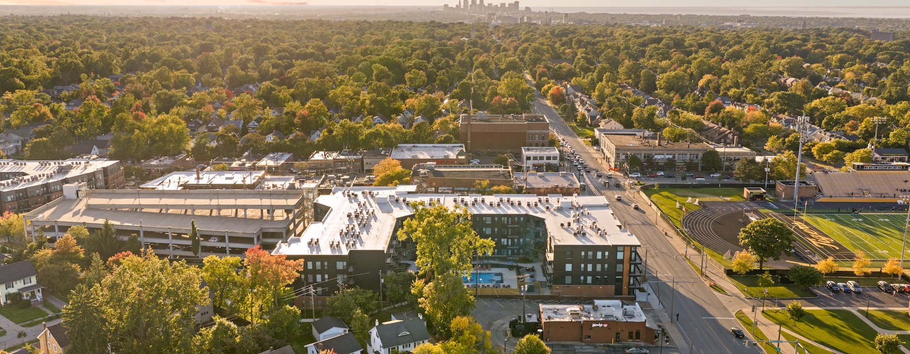 aerial shot of apartment complex and surrounding area