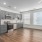 wide open kitchen next to large windows