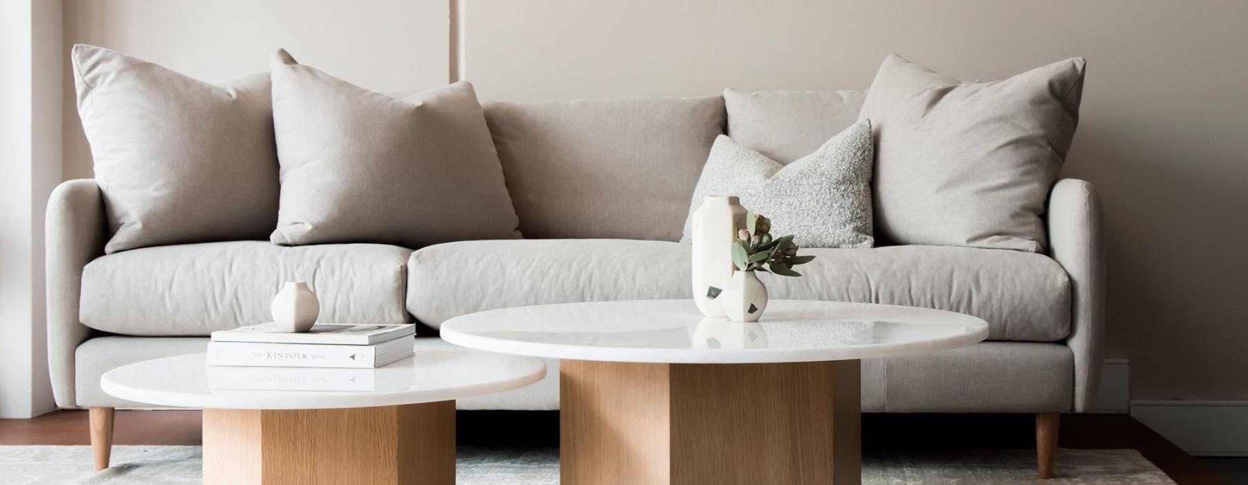 a white couch with a coffee table